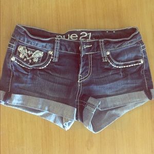 I'm selling dark blue jean shorts.
