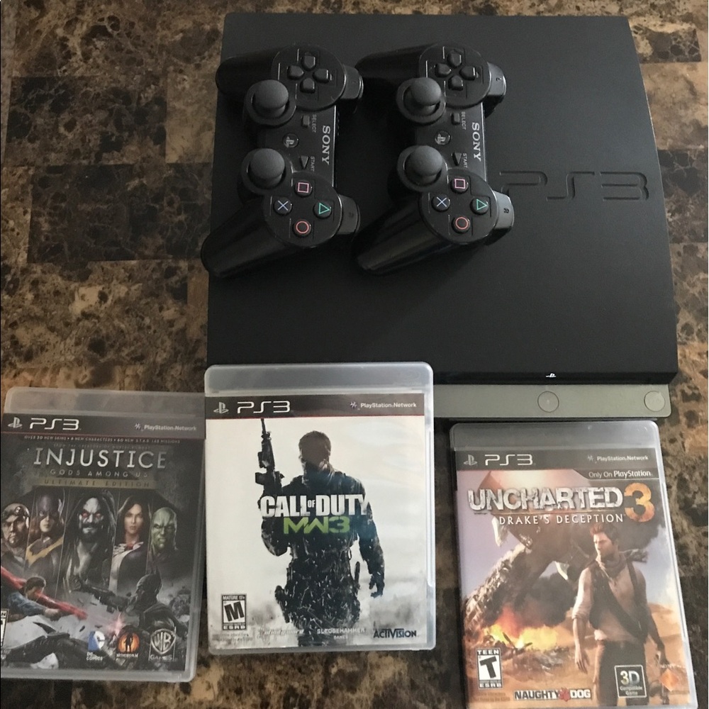 PS3 with three games, three remotes, & chrgng cord