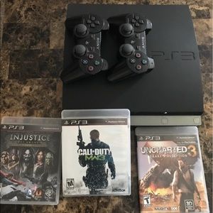 PS3 with three games, three remotes, & chrgng cord