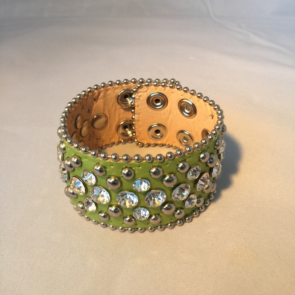 Green leather and crystal studded cuff bracelet.