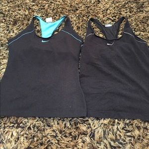 Two Nike fitted workout tanks