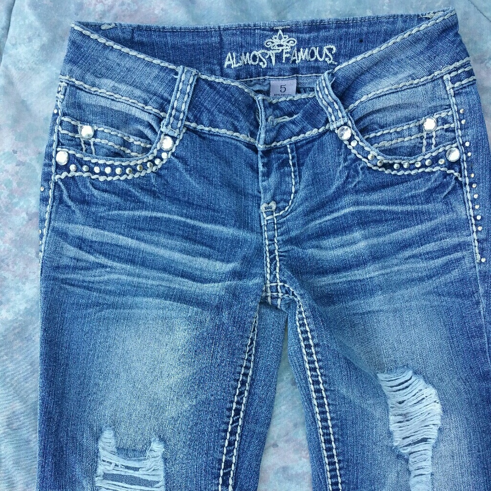 Almost famous holey stretch jeans