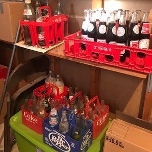 Coke bottles and old coke cases