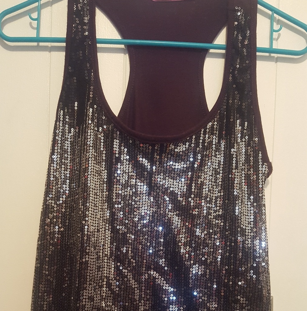 Sparkly tank top. Pairs perfectly with jeans!