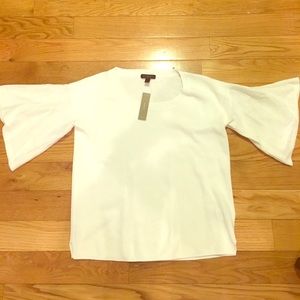 White crew neck top with flair sleeves