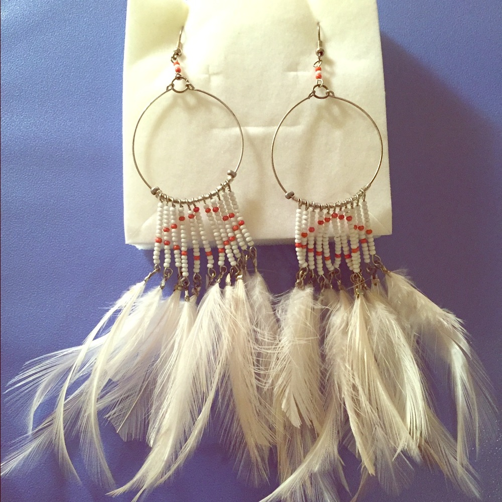 Hand beaded feather earrings!