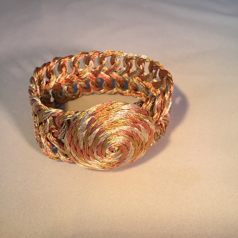 Handwoven wire bracelet.