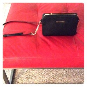 Black cross body with gold hardware