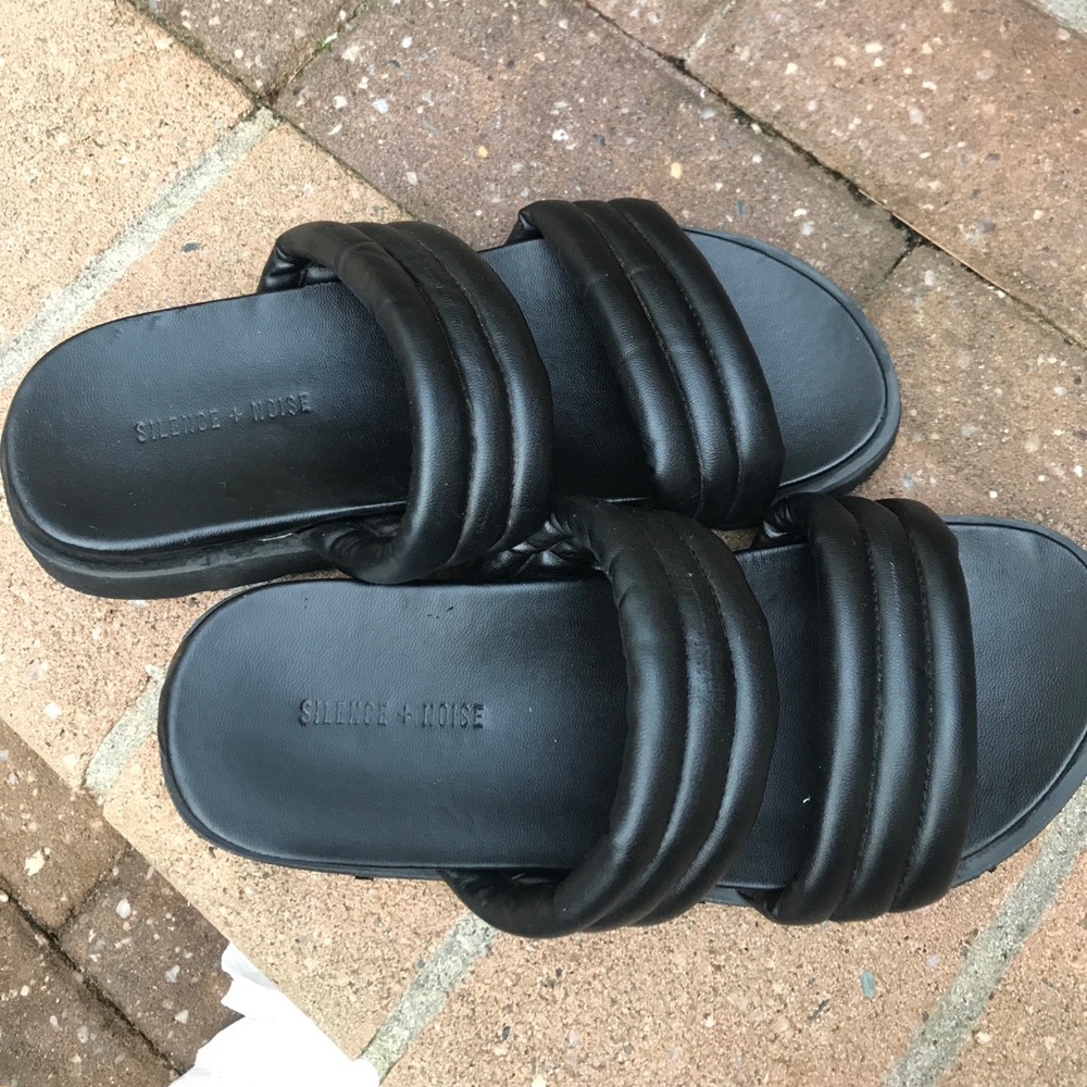 Black puffy slip ons