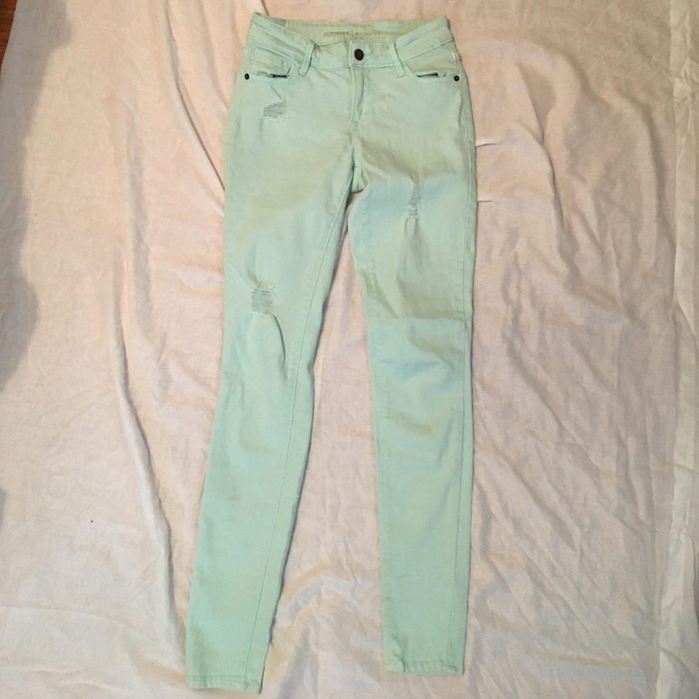 Distressed pastel jeans