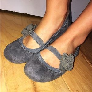 Gray ballet flats with rosettes