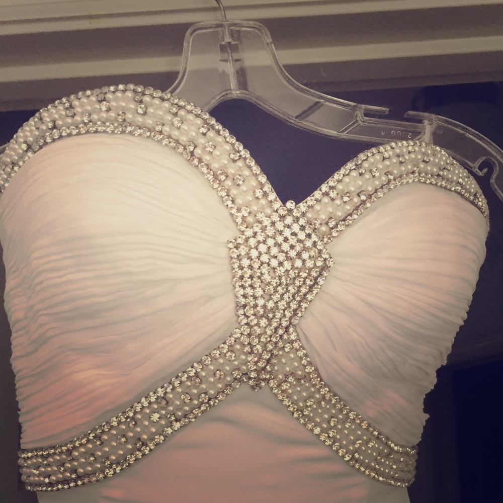 White evening gown with rhinestone back