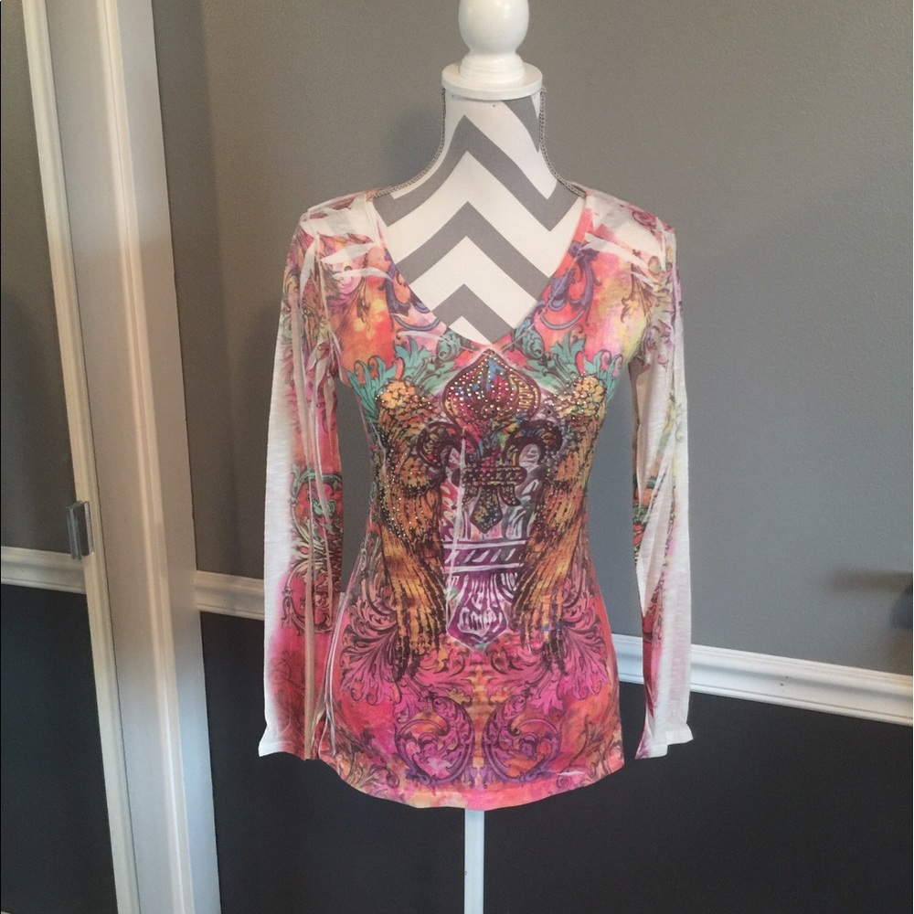 Open back ladder long sleeve graphic top