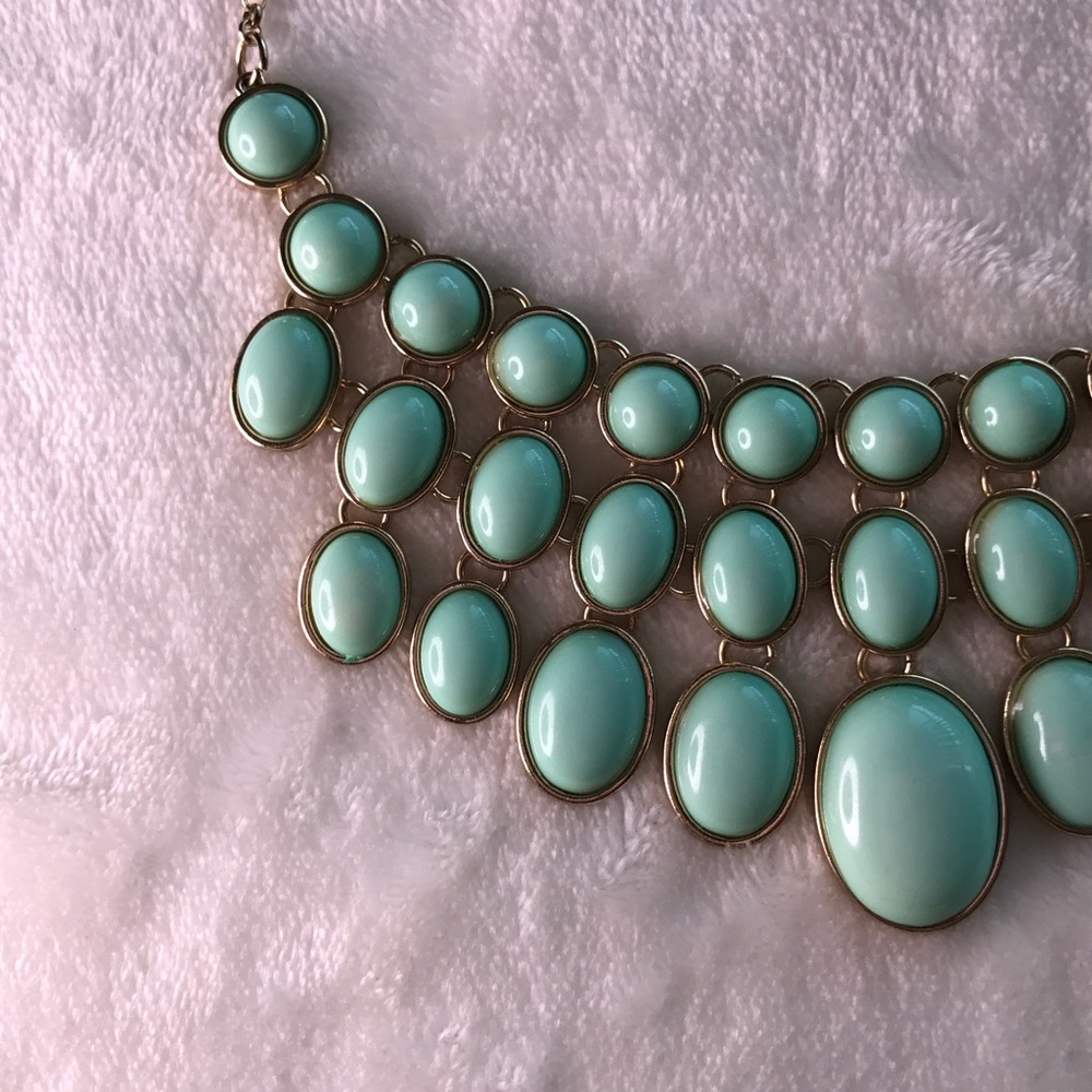Gold necklace with turquoise beads