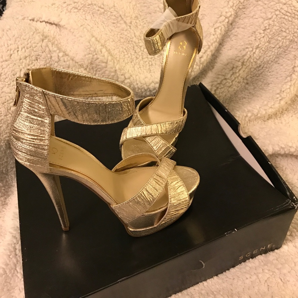 Gold high heels by Shoedazzle