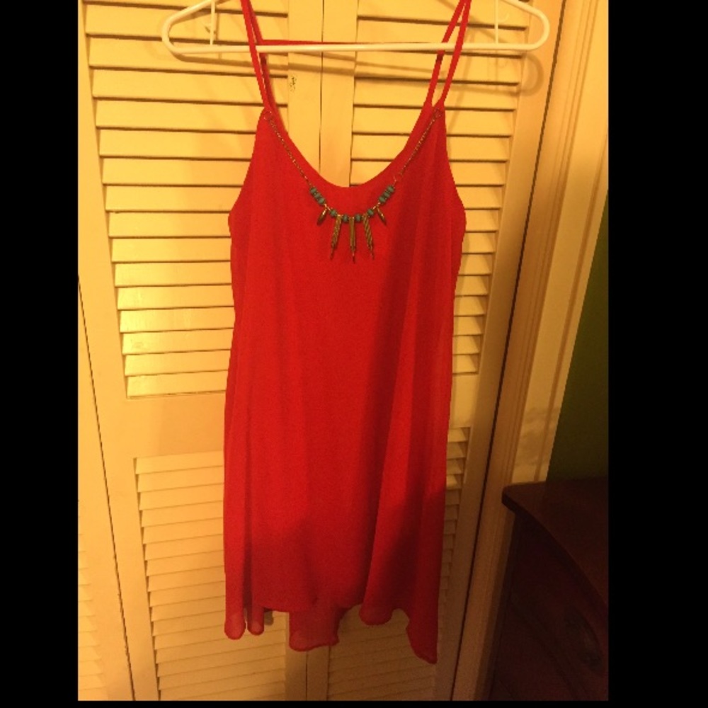 Flowy red dress with teal necklace!