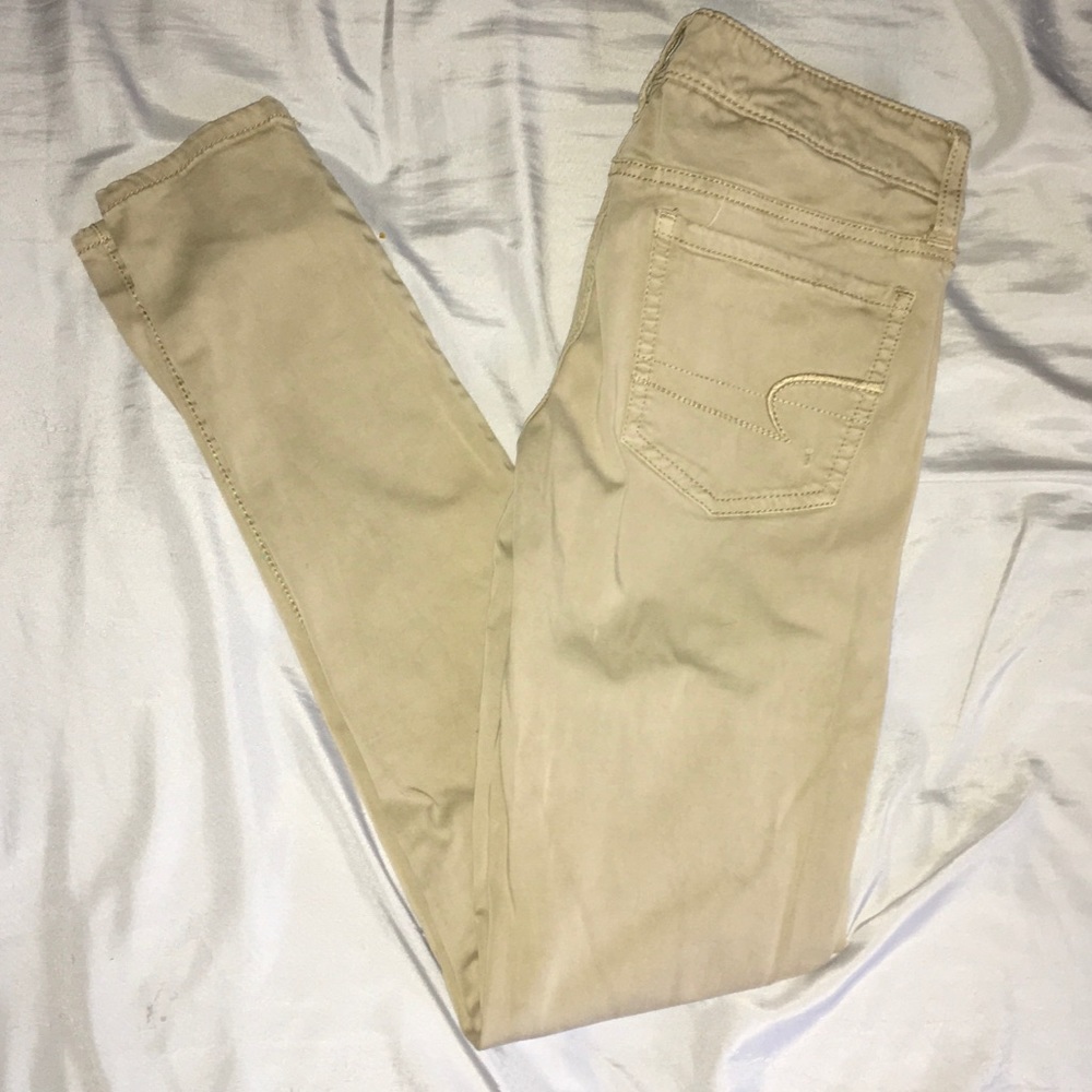 Kaki colored pants.