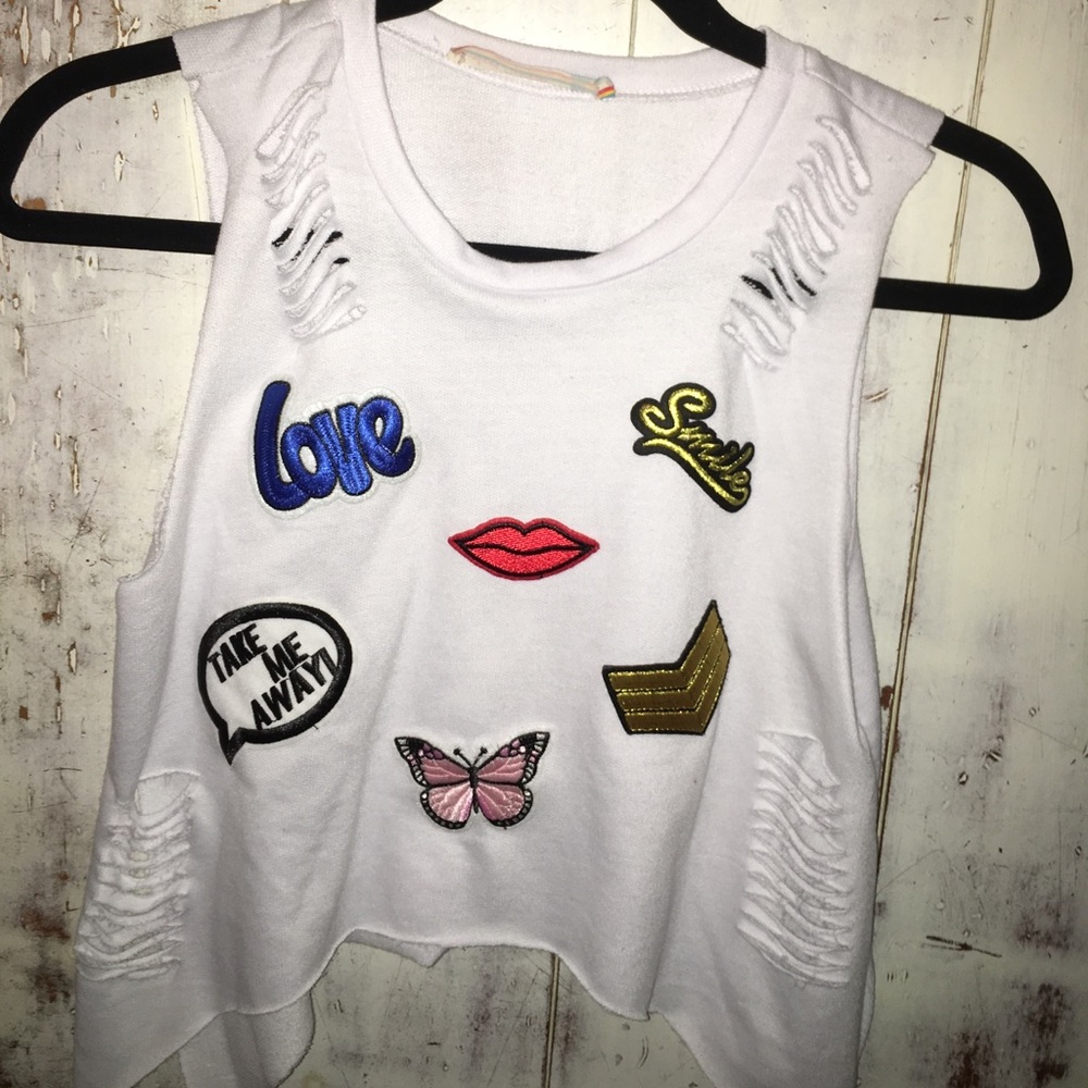 white ripped t-shirt with patches