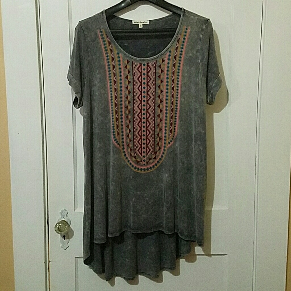 Stretch Knit Short Sleeved tunic with a hi-lo hem