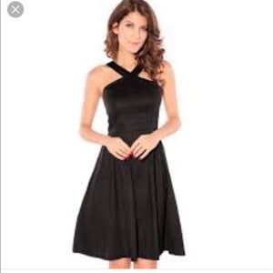 Akiko fit and flare dress in black.