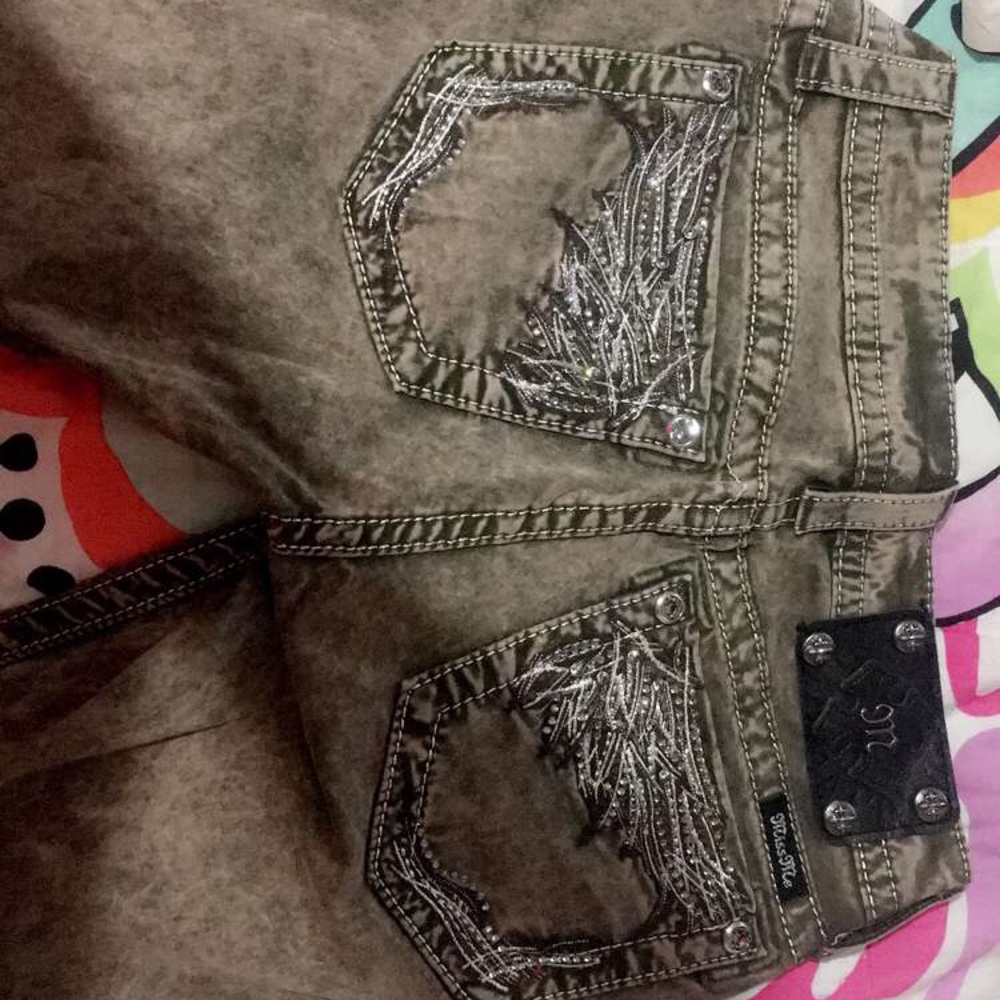 It's a olive army green! Velvet touch.