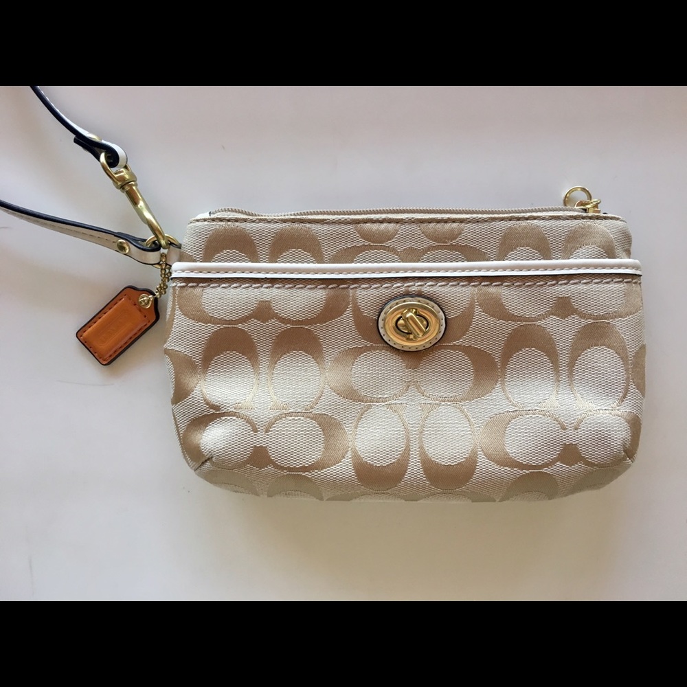 Beige Coach wristlet