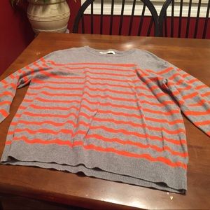 Grey and orange striped sweater