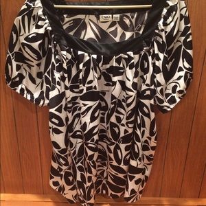 Silky black and white dress top