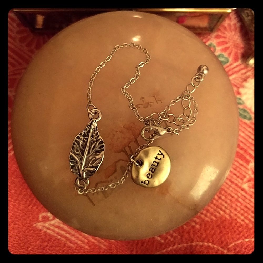 NWOT Dainty beauty and leaf bracelet
