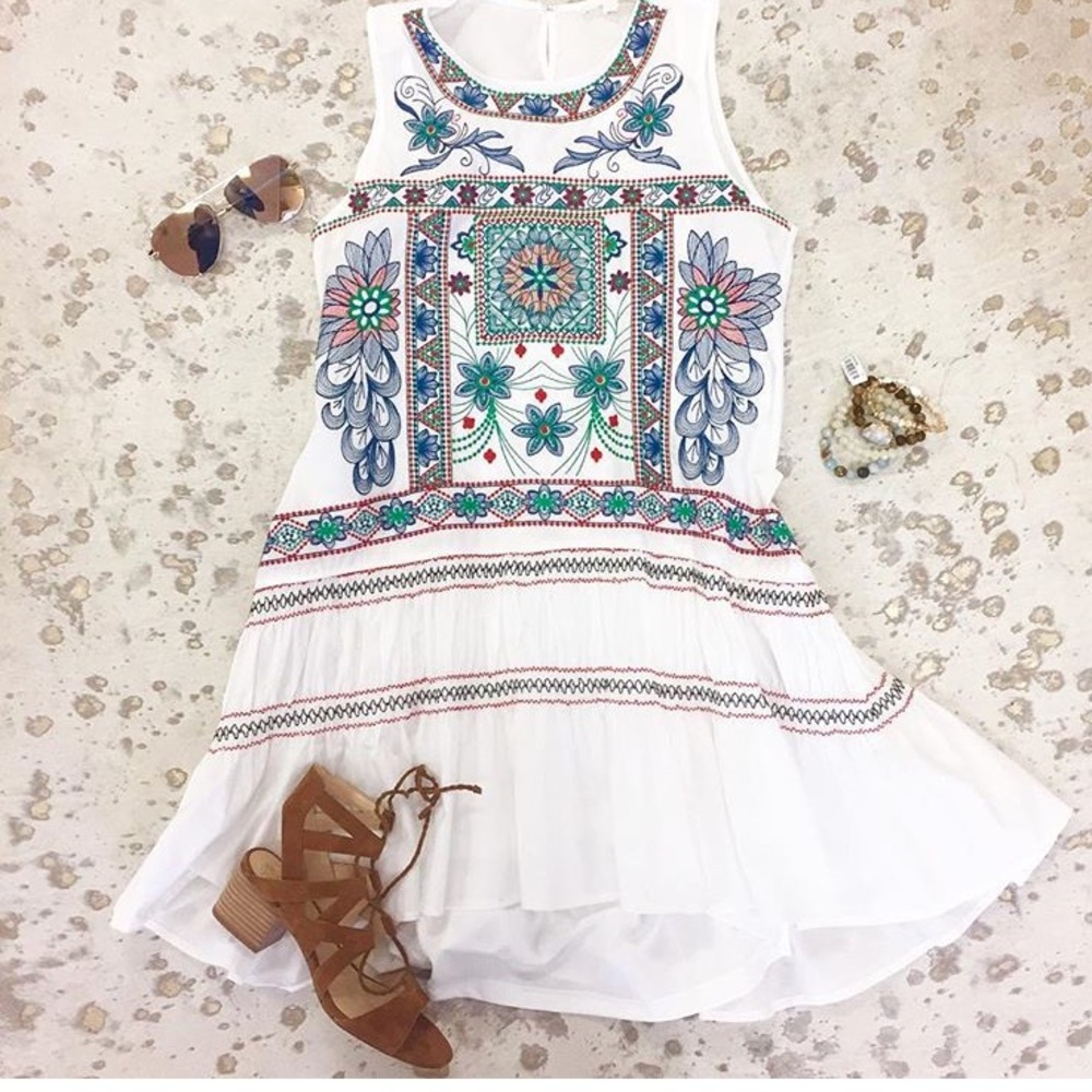 White dress multi embroidered design
