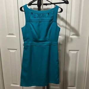 Teal a-line dress with decorative fabric design