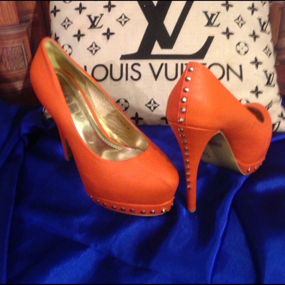 Orange studded heels