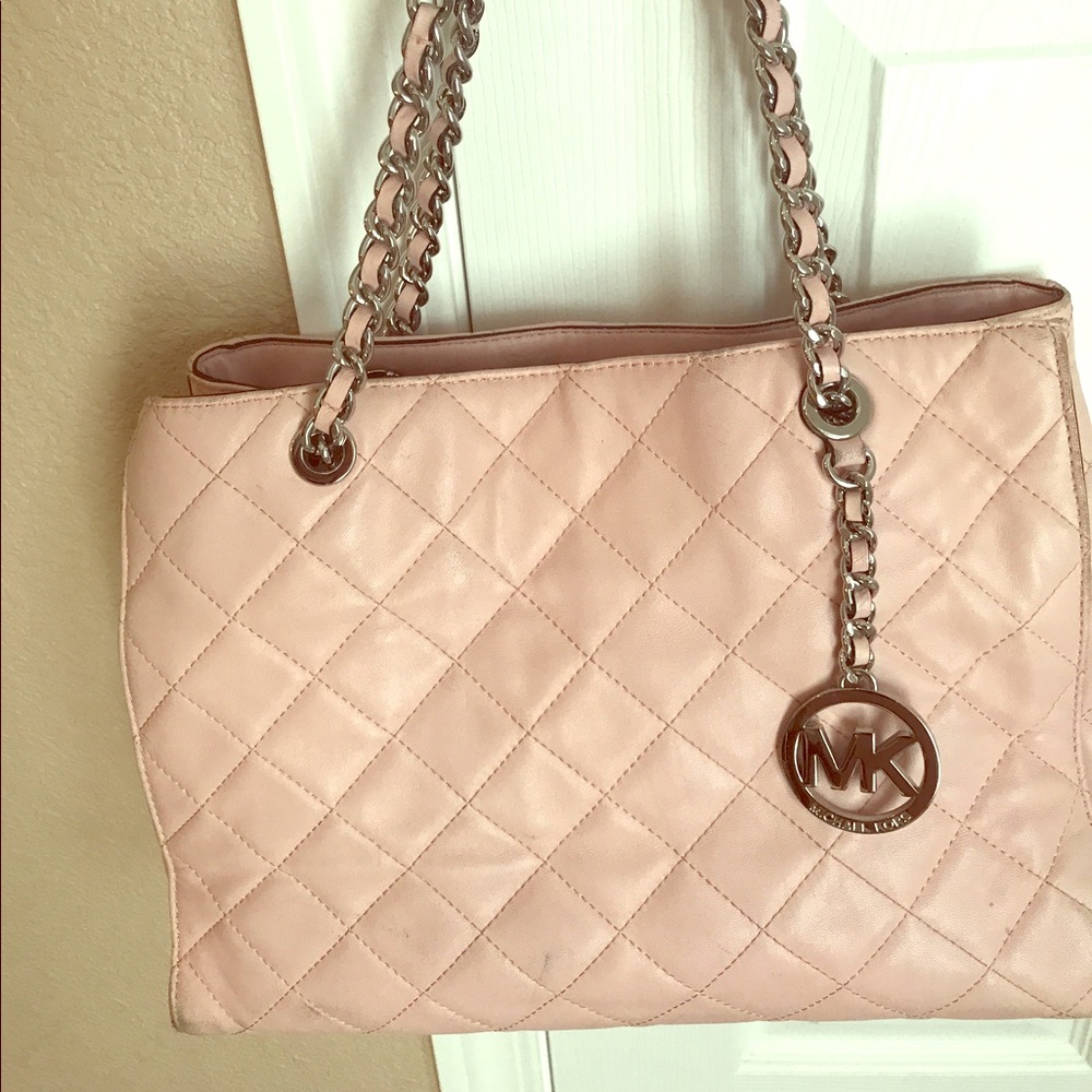 Micheal kors ballet slipper pink satchel.