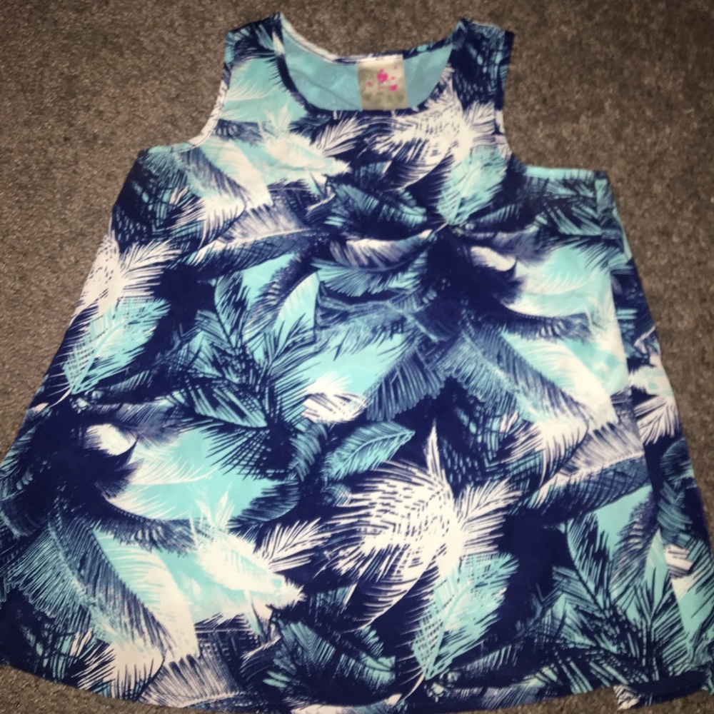 A Hawaiian shirt with palm trees