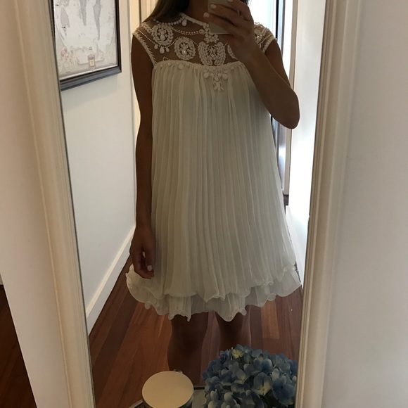 Dresses & Skirts - White Pleated Ruffle Hem Jeweled Neckline Dress