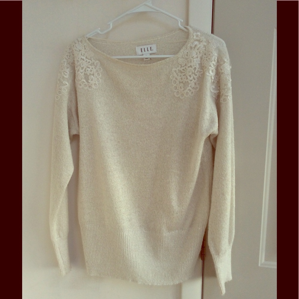 Cream white sweater with shoulder detailing