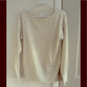 Cream white sweater with shoulder detailing