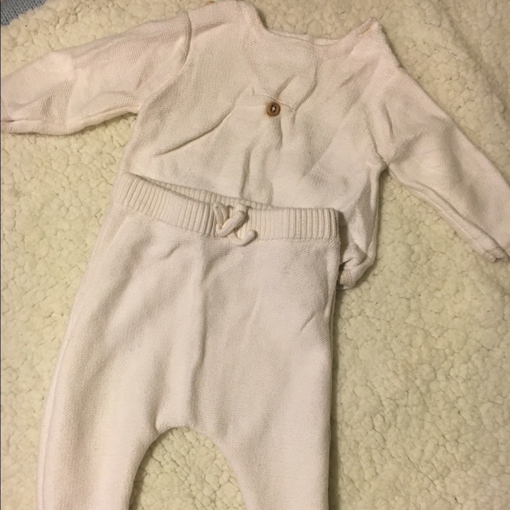 A two piece outfit cream color..
