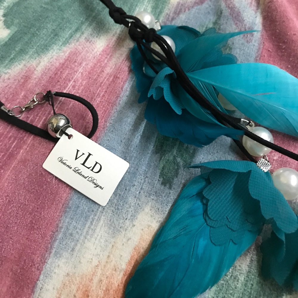 Victoria Leland designs feather pearl necklace