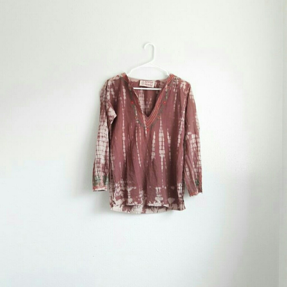 "Made from the earth; wear in peace"