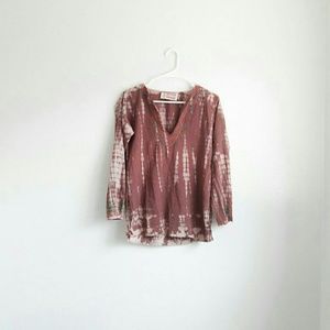 "Made from the earth; wear in peace"