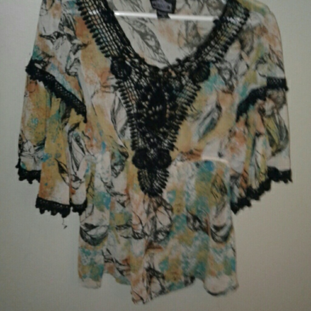 See thru polyester 3/4 sleeve blouse by Angie