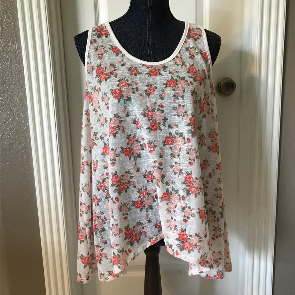 Cute floral tank top with lacy back.