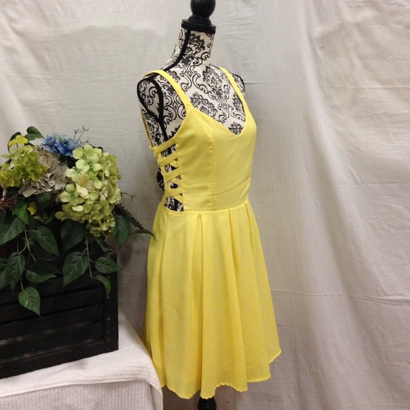 Xtaren Dresses & Skirts - ⭐️SOLD⭐️XTaren Sunshine Yellow Criss Cross Side