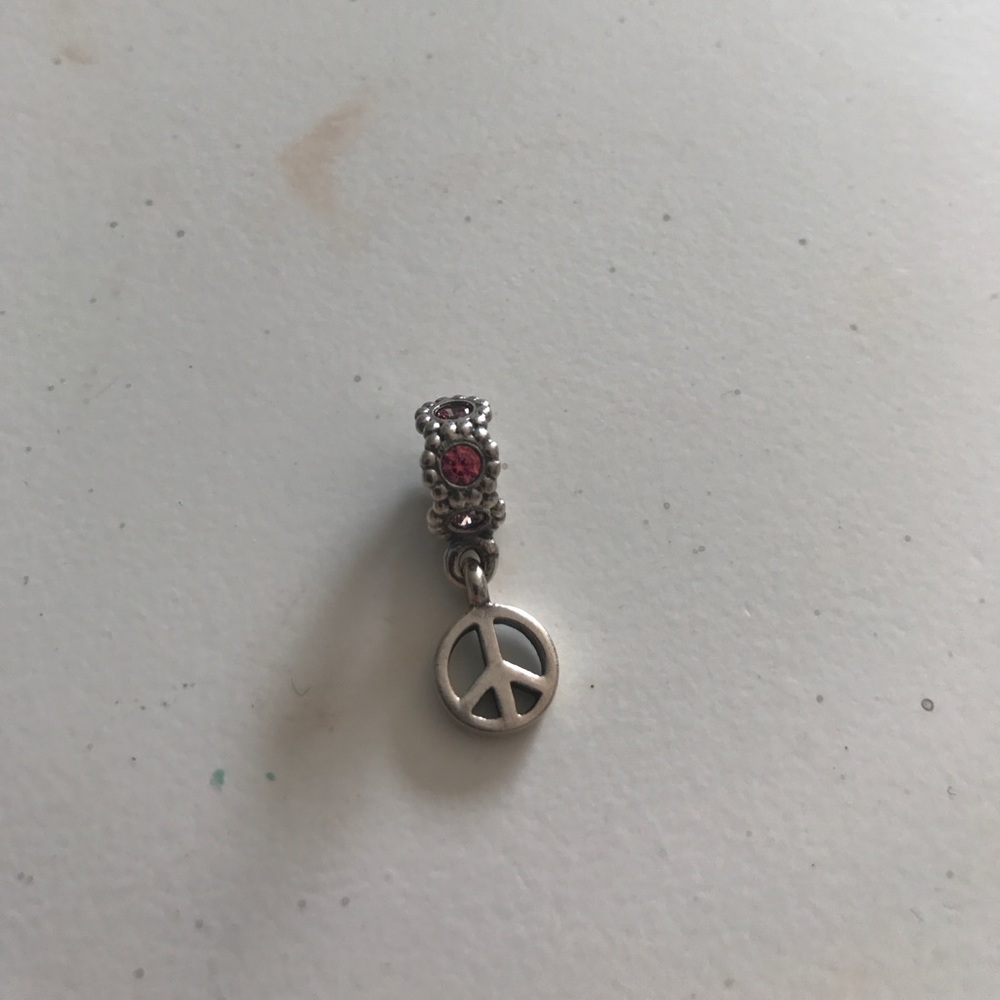 Pandora peace sign charm with pink jewels