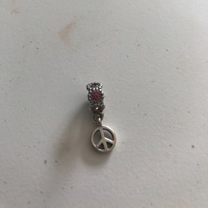 Pandora peace sign charm with pink jewels