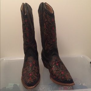 Corral black and red goat with cognac boots