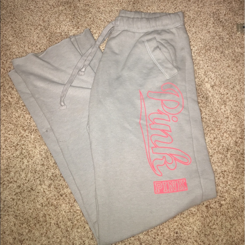PINK sweatpants with neon writing