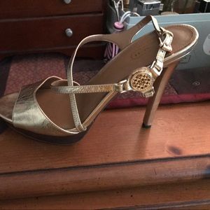 Coach gold stilettos
