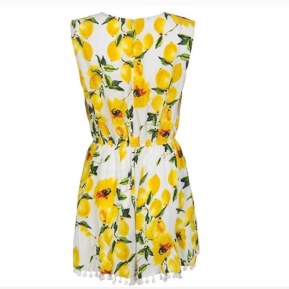  w/tags! Fun and flirty white lemon romper! - Picture 2 of 5